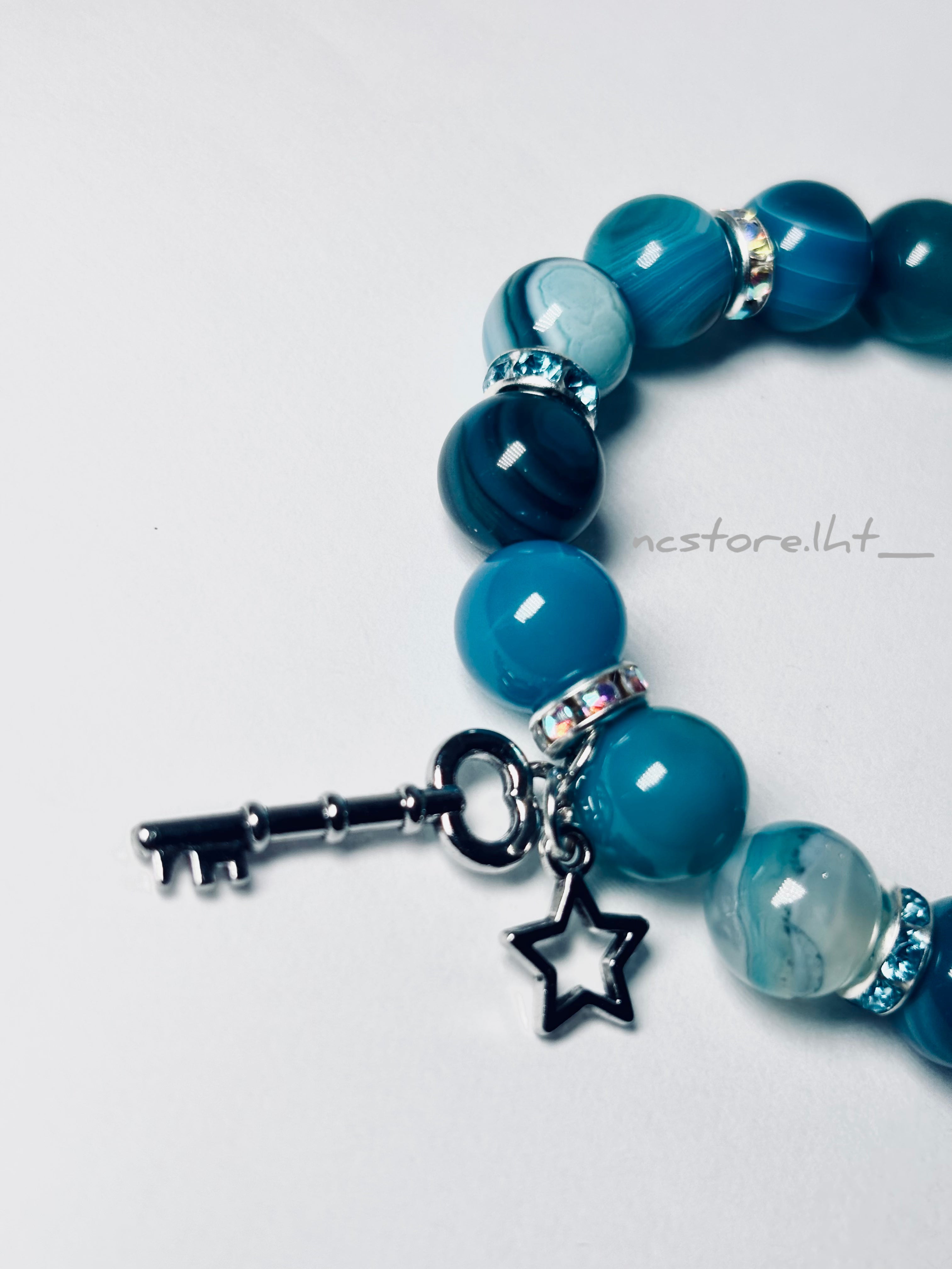 Ocean Blue Healing Bracelet With Key & Star Charm.