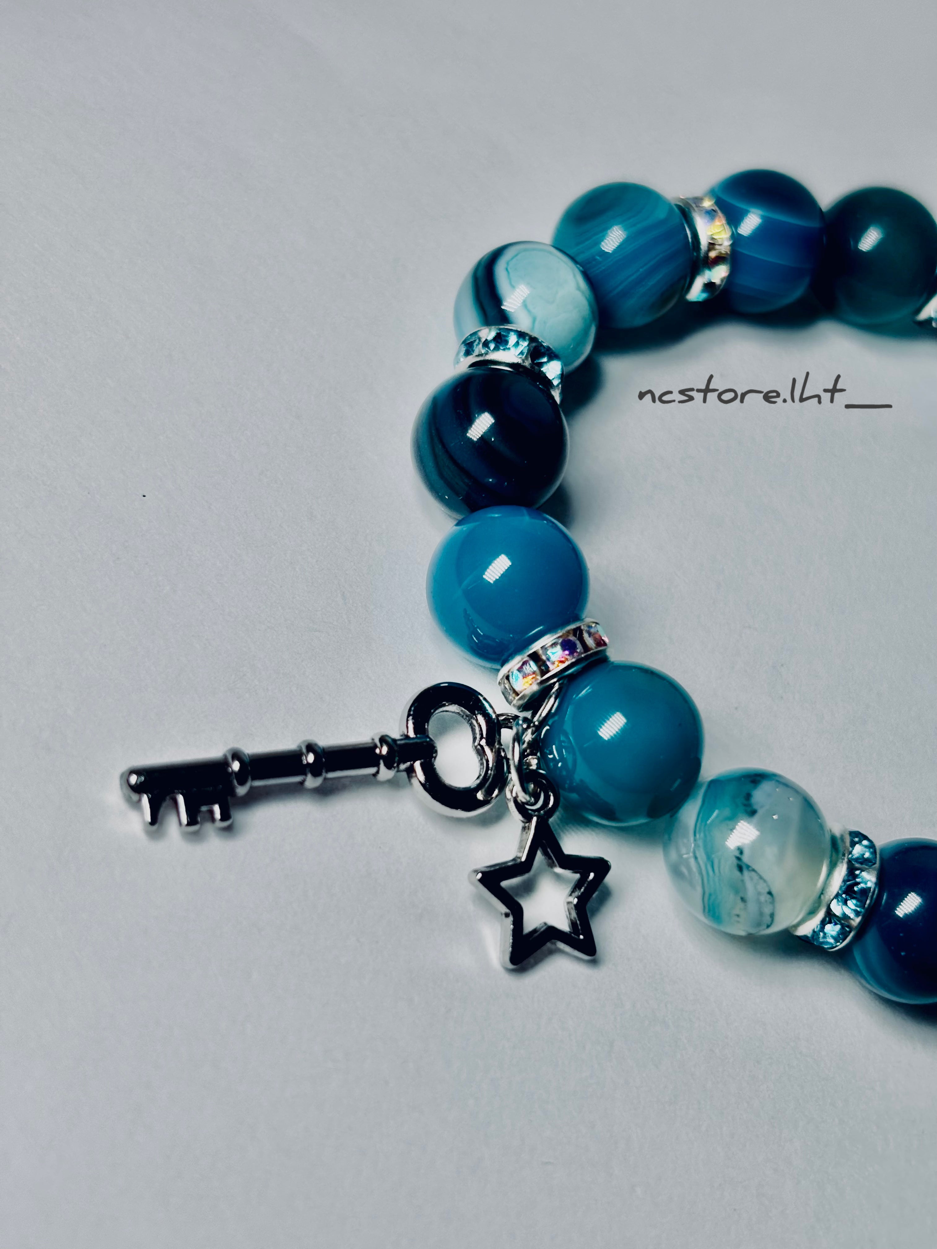 Ocean Blue Healing Bracelet With Key & Star Charm.